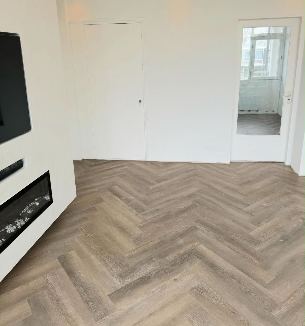 Visgraat rond de Haard — PVC vloer in Rotterdam